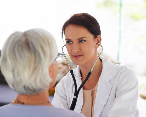 Team member consulting with a patient at Aligned Dental House
